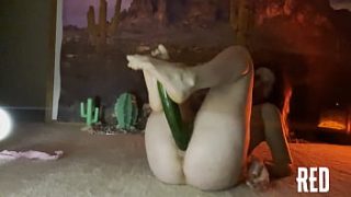 Ginger Woman Enjoys Riding A Lengthy Cucumber