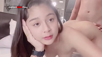 Young Asian Girl With An Adorable Grin Enjoys Doggy Style