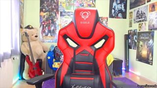 Naughty gamer girl reveals her assets and gets ready to play