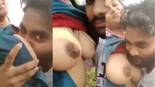 Naughty lover indulges in public passion, savoring her curves under the open sky