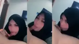 Menggoda dengan Hijab, Mulut Manisnya Mengulum Kemaluan Kekasih