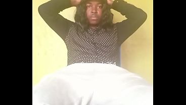 Naughty little sissy stroking a thick black cock until it throbs