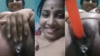 Tamil aunty moaning hard as she fucks herself with a big toy, getting wild and wet